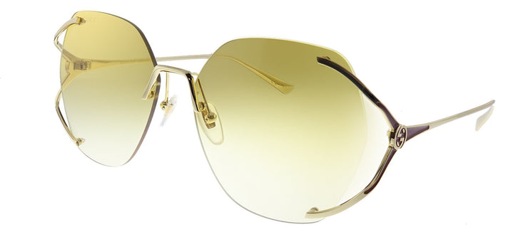 Gucci GG 0651S 005 Oval Metal Gold Sunglasses with Yellow Gradient Lens